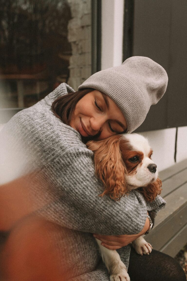 woman hugging cavalier